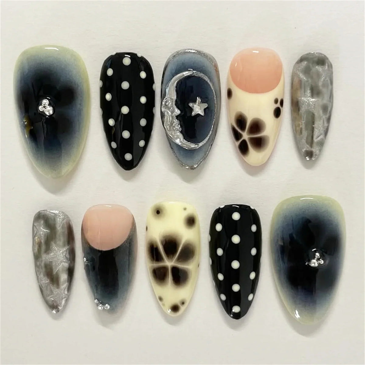 Almond press-on nails, assorted designs