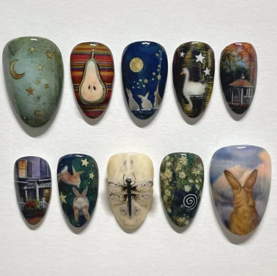 Almond press-on nails, assorted designs