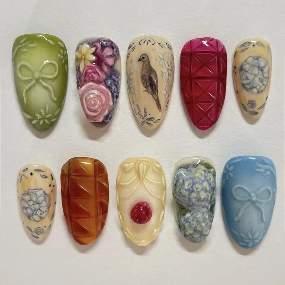 Almond press-on nails, assorted designs