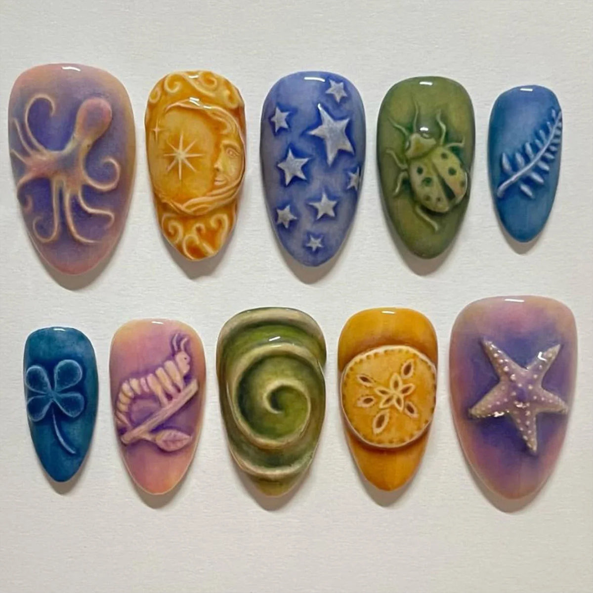 Almond press-on nails, assorted designs