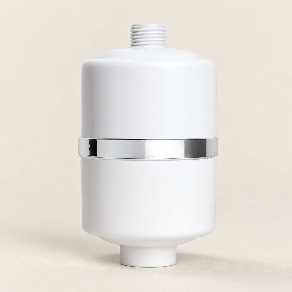 Crystal Quest Shower Filter on a pale stone surface (styled image)